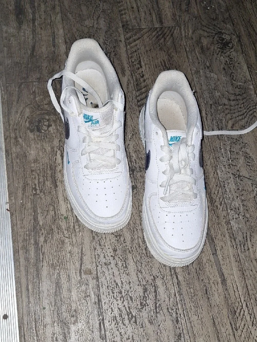 Nike White Low-Top Sneakers with Blue Gradient Swoosh